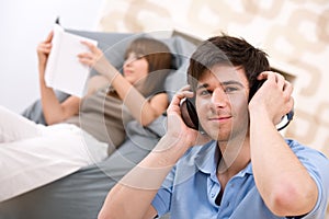 Student - Teenager man relaxing with headphones