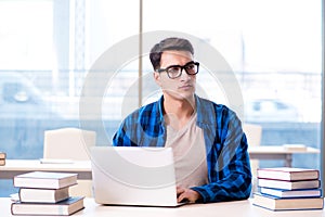 Student in telelearning distance learning concept reading in lib