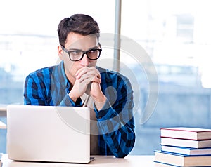 Student in telelearning distance learning concept reading in lib
