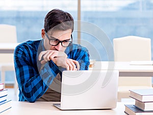 Student in telelearning distance learning concept reading in lib