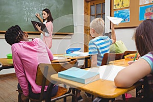 Student about to throw a paper airplane