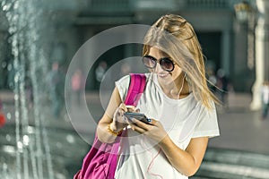 Student Tourist Girl with Phone in Hands