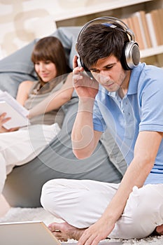 Student - Two teenager with laptop and headphones