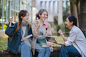 Student university friendship concept with classmate sitting together at campus college park. Youth teenage and