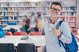 the student uses a notebook, latop and a school library