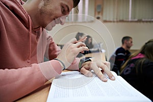 the student uses a smartwatch in math class