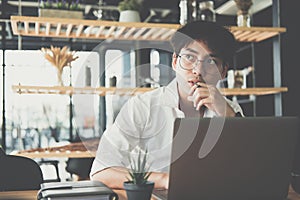 Student using computer for learning leasson online at cafe. star