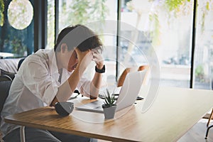 Student using computer for learning leasson online at cafe. star