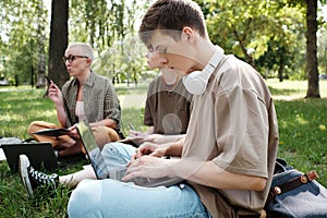 Student using laptop in study outdoors