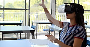 Student using virtual reality headset in classroom