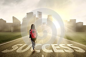Student walking on the success way