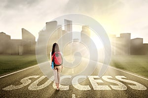 Student walking on the success way 1