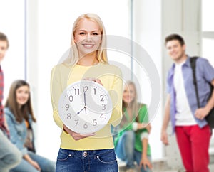 Student with wall clock