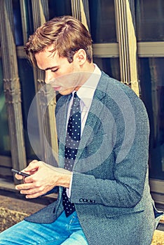 Young Man Texting anywhere.