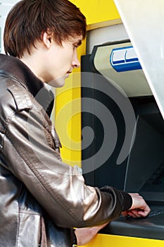 Student withdrawing money photo