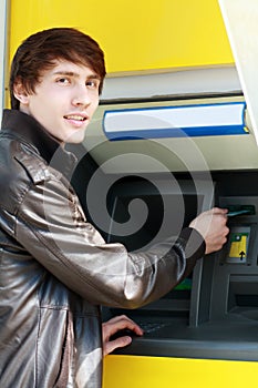 Student withdrawing money photo