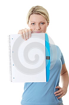 Student woman holding blank copybook