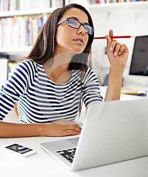 Student, woman and laptop at library in education, thinking or confused for problem solving at college. Girl, person and