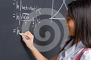 Student working on mathematics problem photo