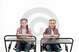 Students classmates sit desk. Back to school. Private school concept. Individual schooling. Elementary school education photo