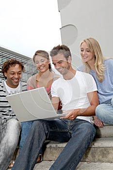 Students in college with computer