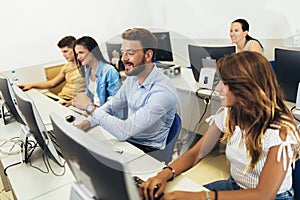 Students in a computer lab, using computers during class