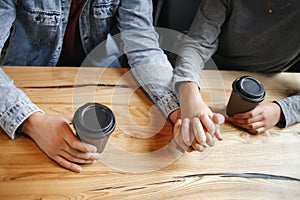 Students couple having a romatic lunch indoors closeness