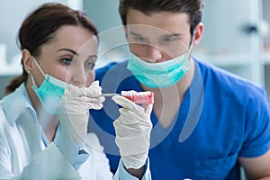Students with dental prosthesis, dentures, prosthetics work.