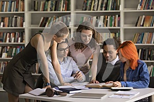 Students discuss joint task, share opinion gathered in library