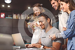 Students doing group project in campus library