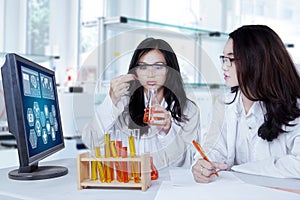 Students doing research in the lab