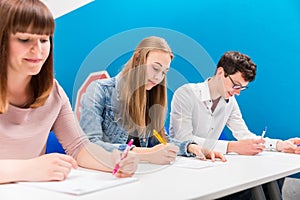 Students in driving lessons listening attentively