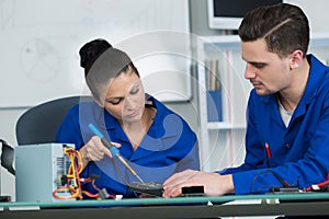 students in electronics class at university