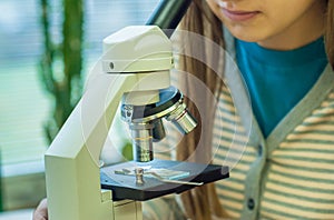 Students experimenting and discovering in science class