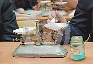 Students experimenting and discovering in science class