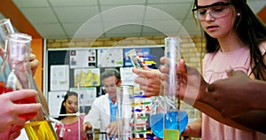 Students experimenting in laboratory 4k