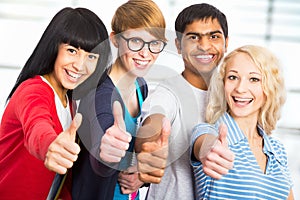 Students giving the thumbs-up sign