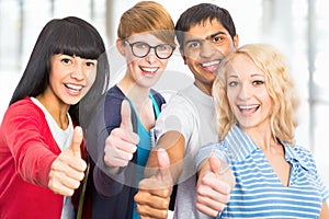 Students giving the thumbs-up sign