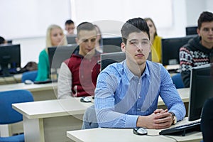 Students group in computer lab classroom