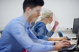 Students group in computer lab classroom