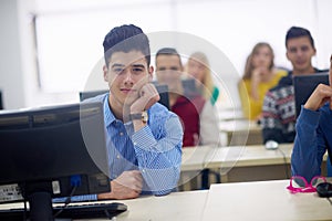 Students group in computer lab classroom