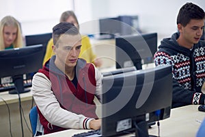 Students group in computer lab classroom