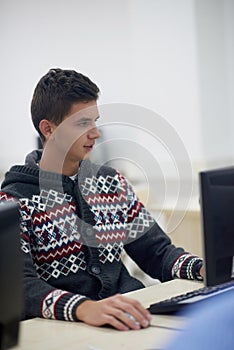 Students group in computer lab classroom