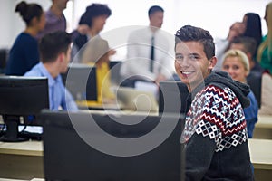 Students group in computer lab classroom