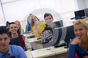 Students group in computer lab classroom
