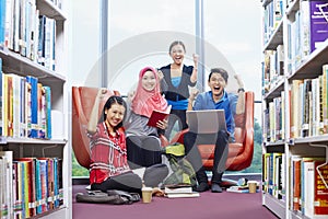 Students having study group in library. Conceptual image