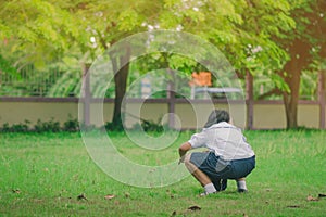 Students help to pull out the take-advantage weedsand keep dry