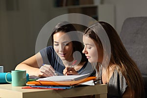 Students helping to learn in the night at home