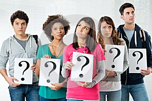 Students Holding Question Mark