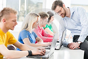 Students at the informatics and programming lesson photo